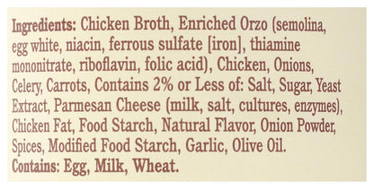 golden chicken broth base with visible chunks of real vegetables and tender chicken pieces
